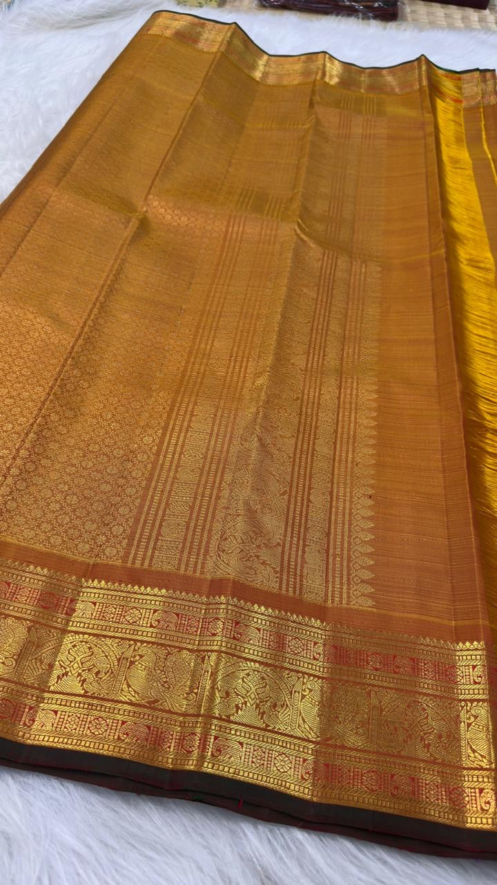 Burnished Ochre Gold Handwoven Pure Silk Kanjeevaram Vairaoosi Saree with Gold Zari Buttas and Traditional Zari Border