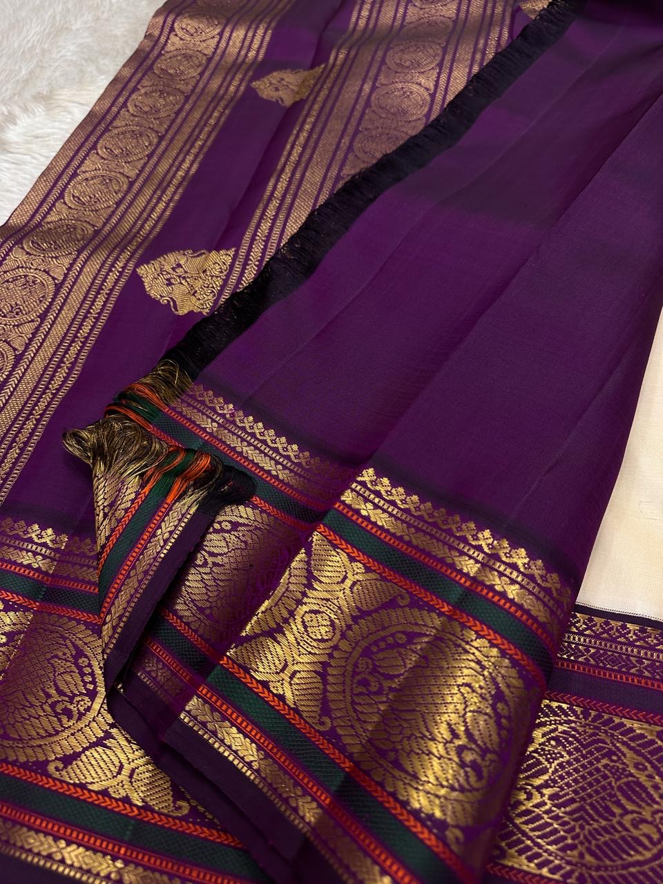 Off white Kanchi Pattu saree with lightweight Korvai purple red green border — Idam Living