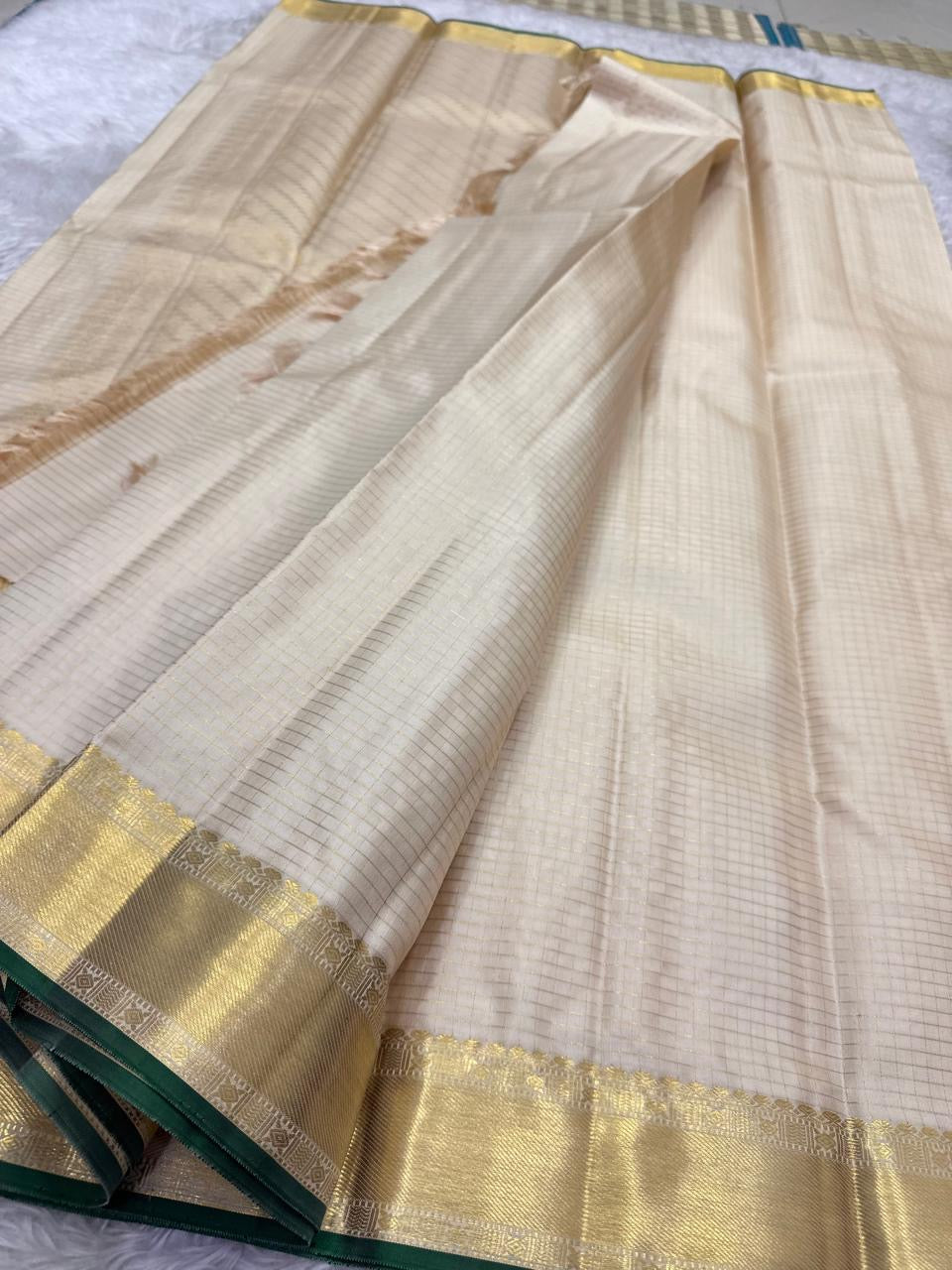 Off-white Zari Kattam pure silk KanchiPattu saree with antique gold zari border — full overview, Idam Living