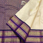 Off-white silk surface with gold zari elephant motif detail