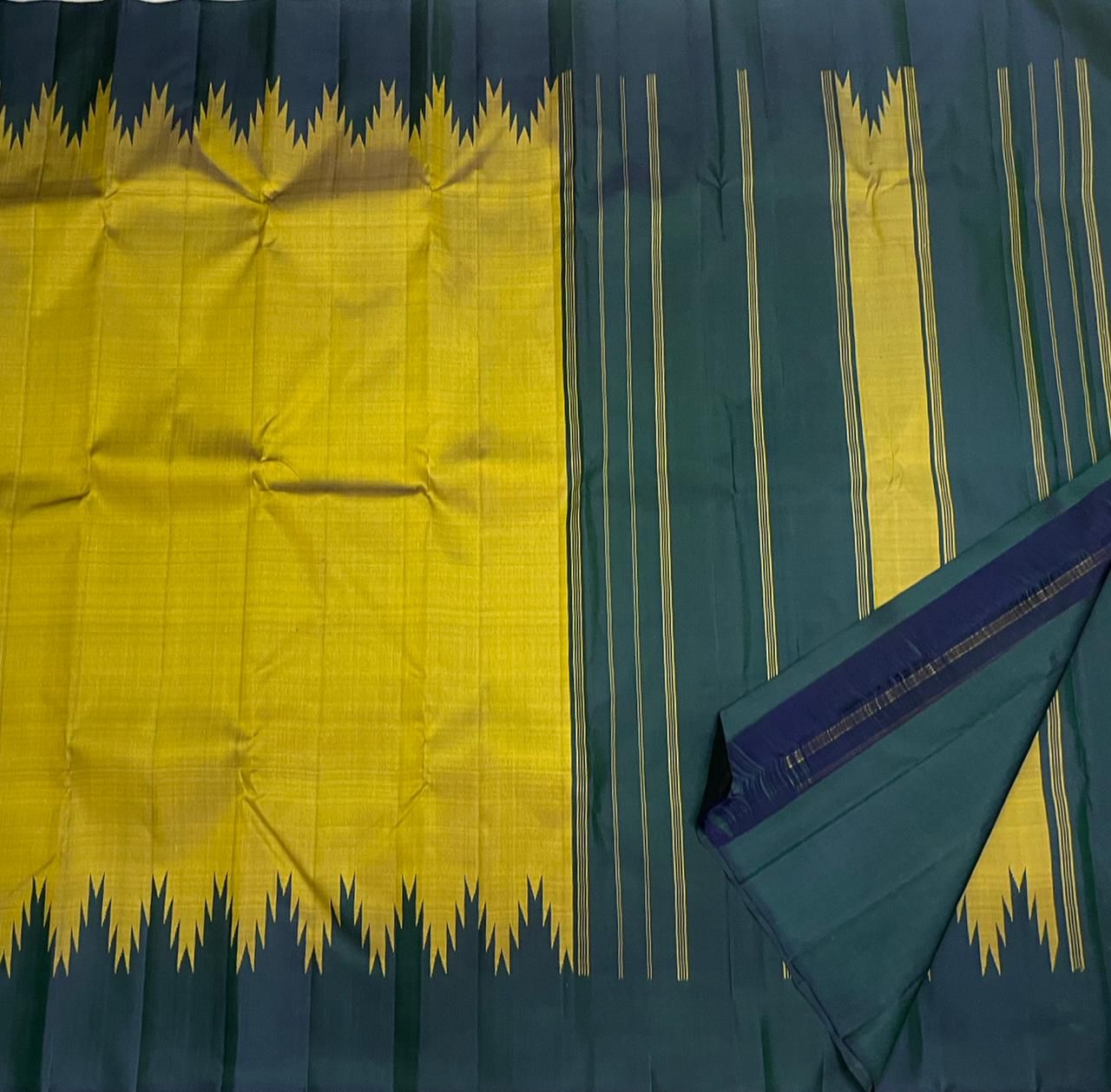 Wide flat lay showing olive green body with forest green Thazampoo Reku border, shipped from New Jersey USA