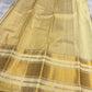 Olive Turmeric Gold Kanchipuram silk contrasted with luminous jasmine-ivory Paal Vellai and warm gold zari.