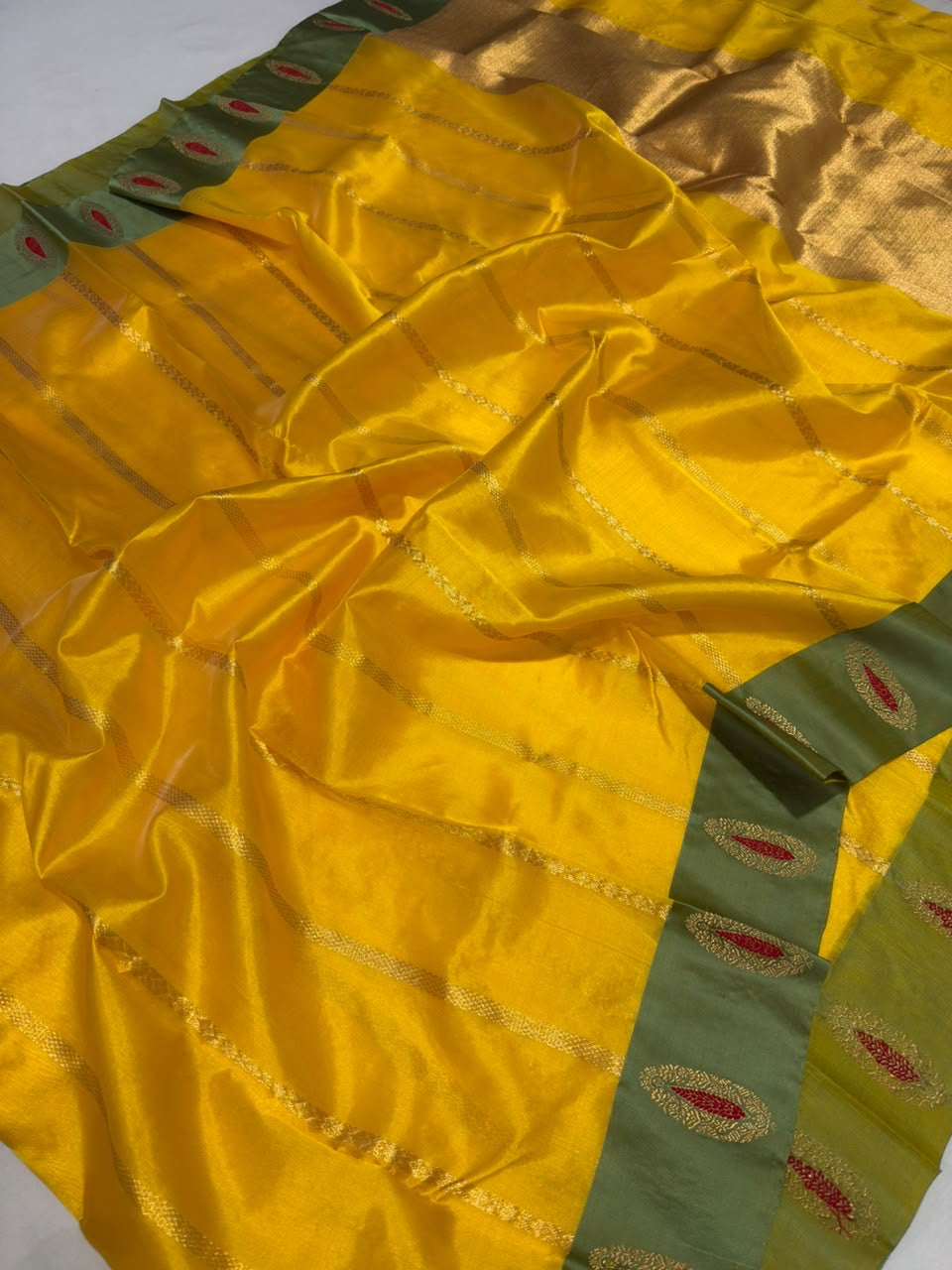 Olive-green border on golden yellow Chanderi silk saree