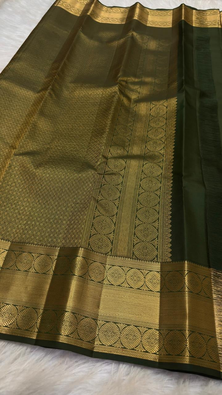 Green Kanjipuram saree with rich gold zari pallu