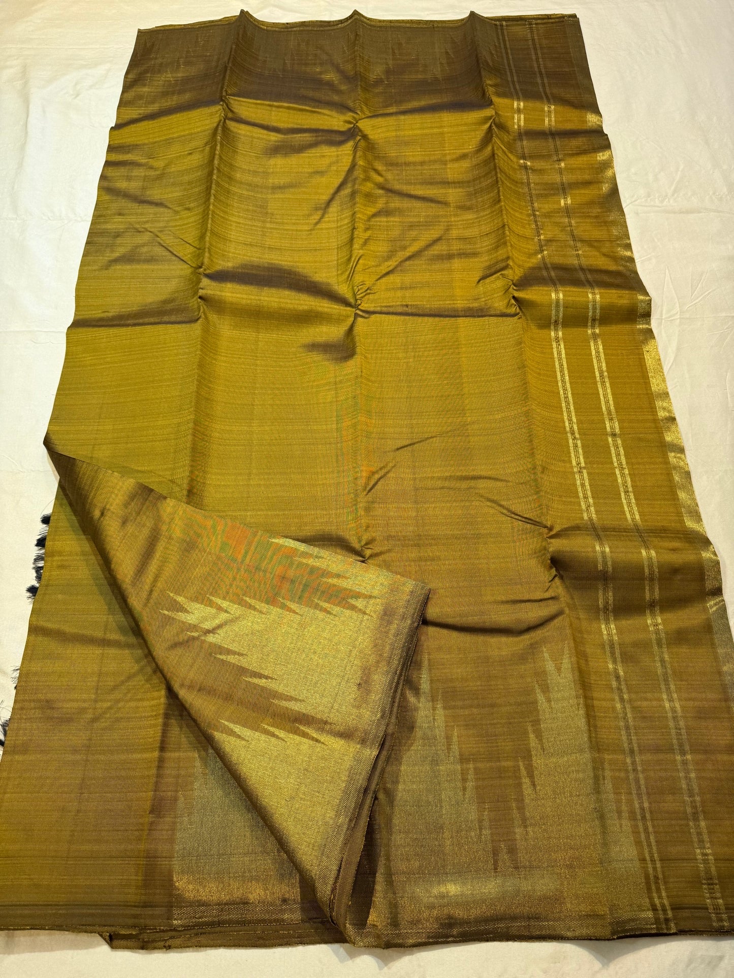 Ettukol flame motifs in antique copper zari on olive green Kancheepuram silk saree — Idam Living