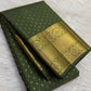 Olive Kanjeevaram saree with traditional gold border