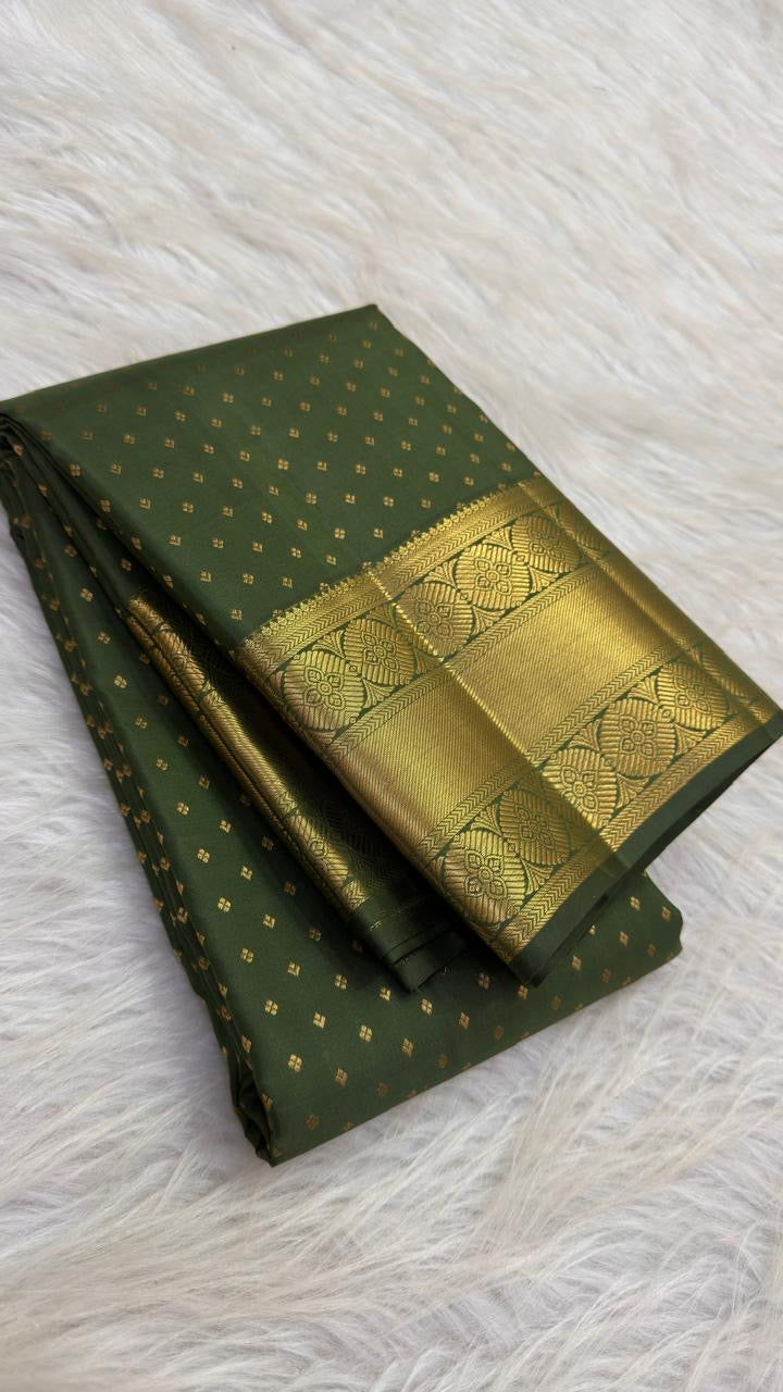 Olive Kanjeevaram saree with traditional gold border