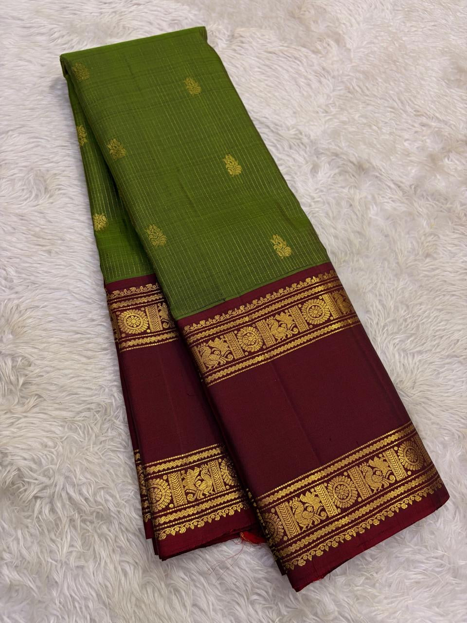 Olive Green and Deep Maroon Handwoven Pure Silk Kanjivaram Saree with Sorgavaasal Mayil Border