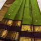 Olive green Kanchipuram silk saree gold zari butta detail on body
