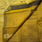 Close-up of ettukol antique copper zari border on olive green Kanchipuram pure silk saree — Idam Living