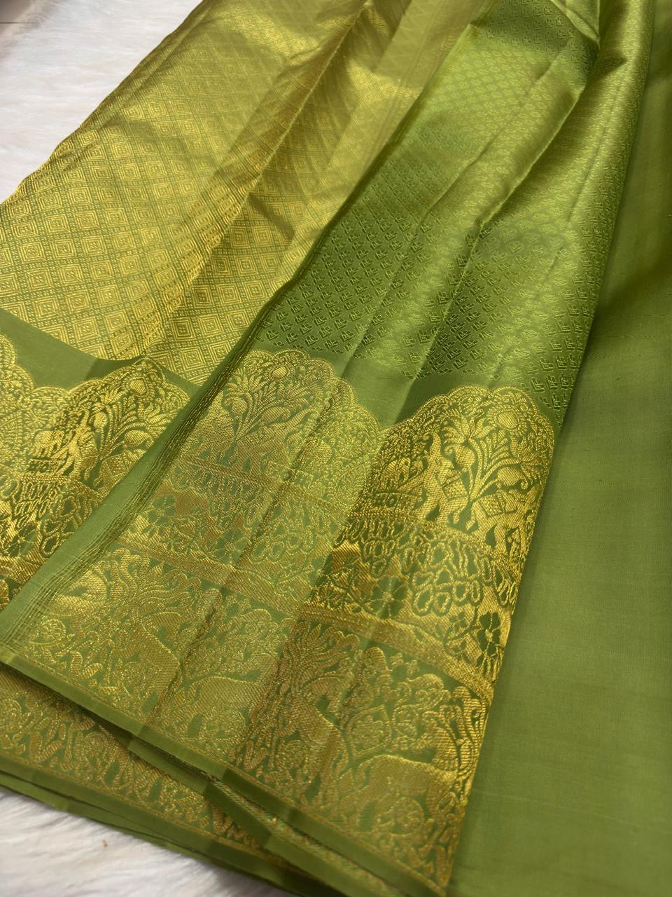 Olive green Kanchipuram saree with traditional motifs, Idam Living