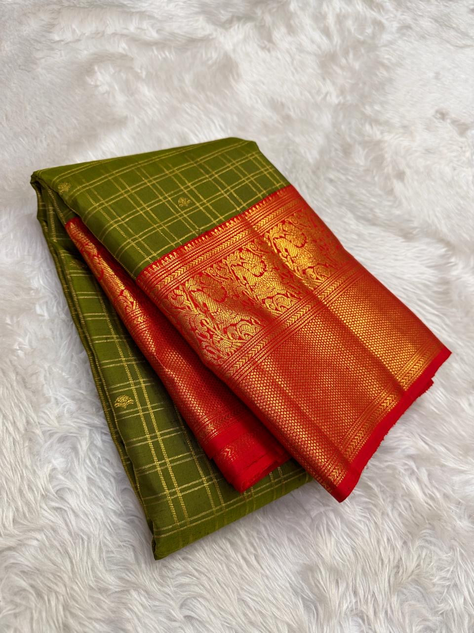Olive Green pure silk Kanjivaram saree, Zari Kattam weave with Vermilion Gold Zari border — full drape view