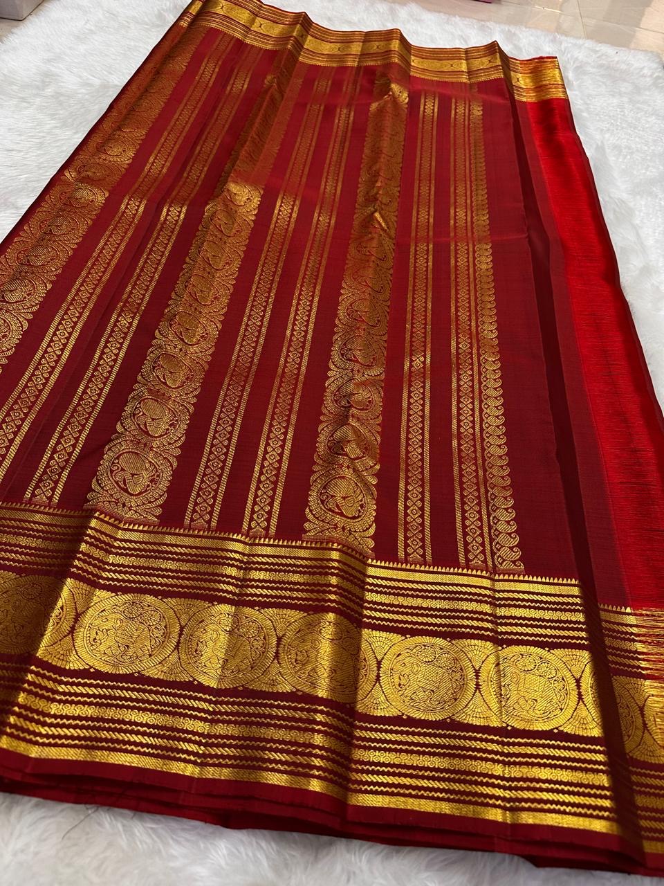 Sorgavasal peacock medallion close-up on olive green Kanchipuram pure silk saree — Idam Living