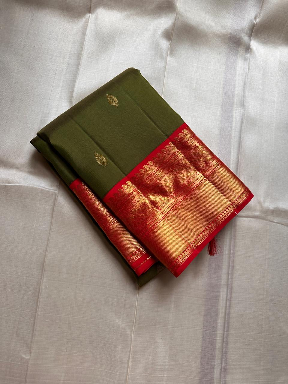 Olive Green Kanjipuram Korvai silk saree folded view