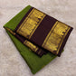 Olive green Kanjivaram silk saree folded showing Rettapet elephant border