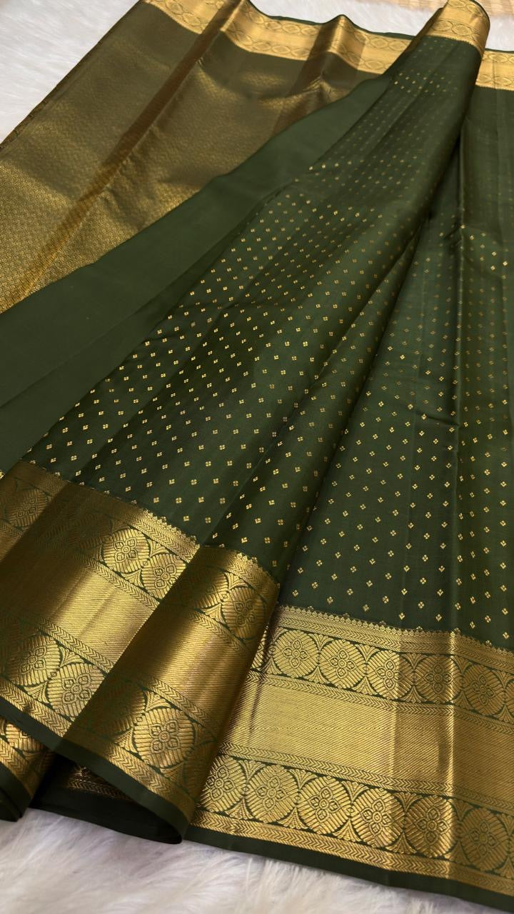 Green Rettapet Kancheepuram saree with broad zari border