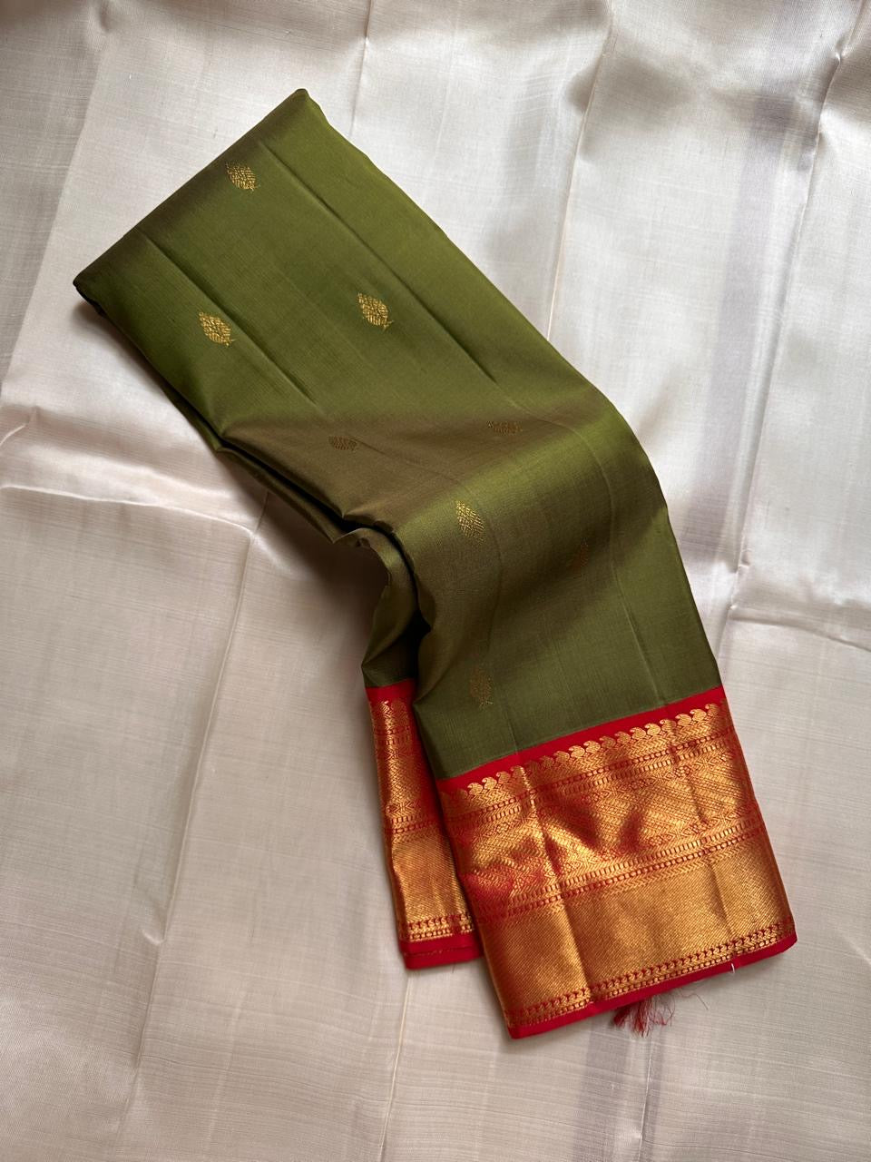 Olive Green handwoven pure silk Kanjipuram saree, Korvai weave with vermilion red border — full saree overview — Idam Living