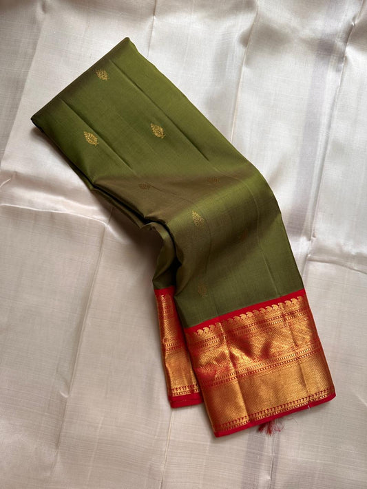 Olive Green handwoven pure silk Kanjipuram saree, Korvai weave with vermilion red border — full saree overview — Idam Living