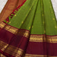 Olive Green and Deep Maroon Handwoven Pure Silk Kanjivaram Saree with Sorgavaasal Mayil Border