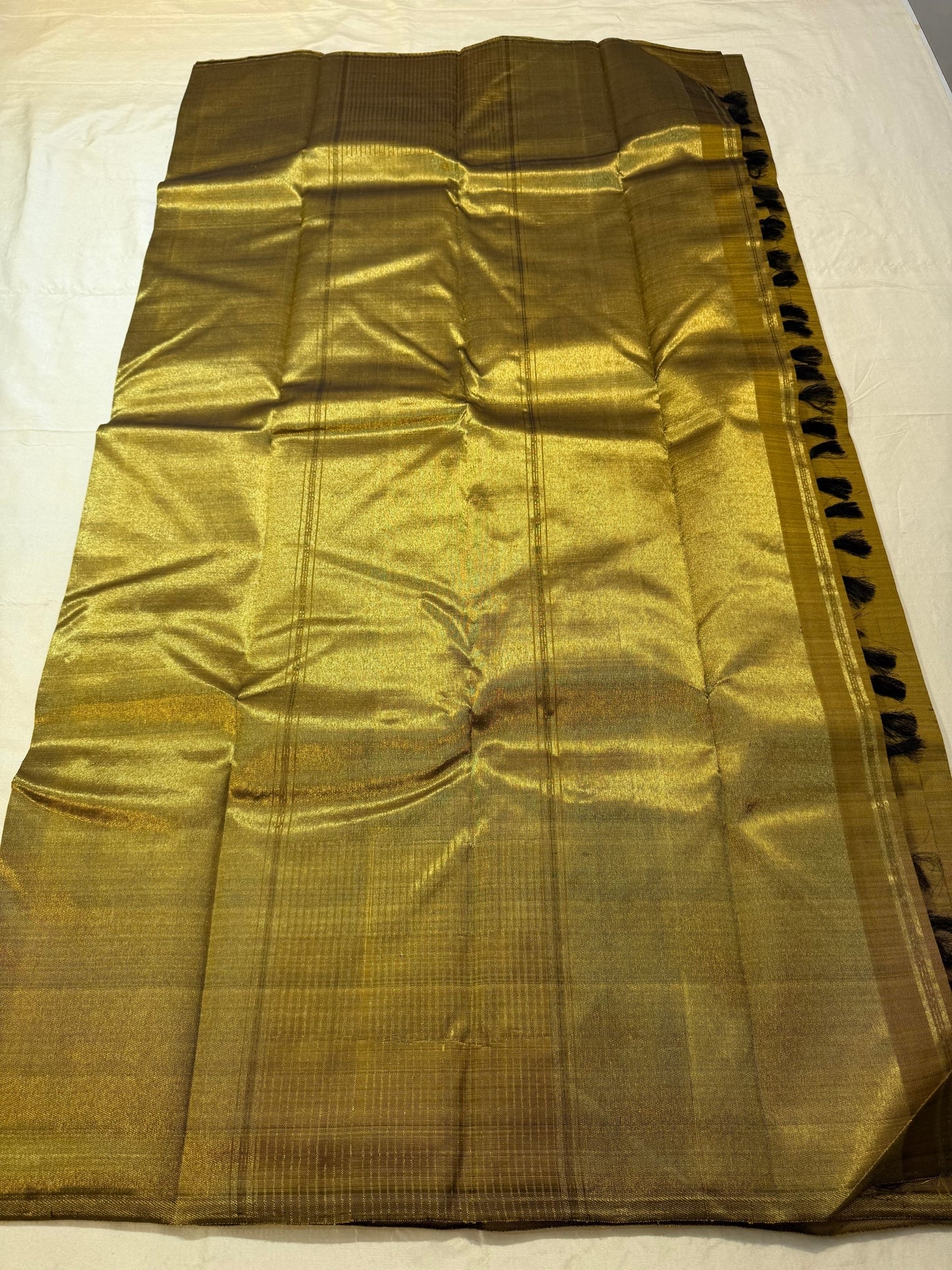 Self olive green border with ettukol antique copper zari on handwoven Kanchipuram saree — Idam Living