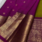 Olive green Pure Silk Kanjivaram Butta saree with magenta contrast and grand heirloom zari craftsmanship