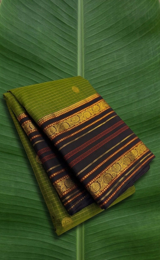 Pure Kanchipuram silk saree in olive green with charcoal black border and antique gold zari weaving