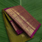 Pure Kanchipuram Butta silk saree in olive moss green with Yazhi motifs and rani magenta border