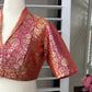 Ombré pure silk Banarasi blouse in peach pink and red with a green Meenakari centre, Idam Living