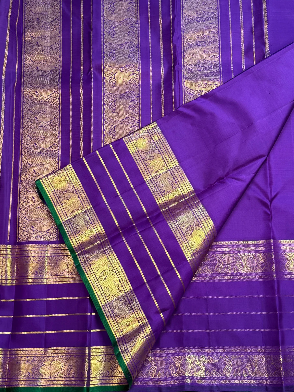 Yazhi border of a Royal Purple Kancheepuram Varisaipet saree - Idam Living