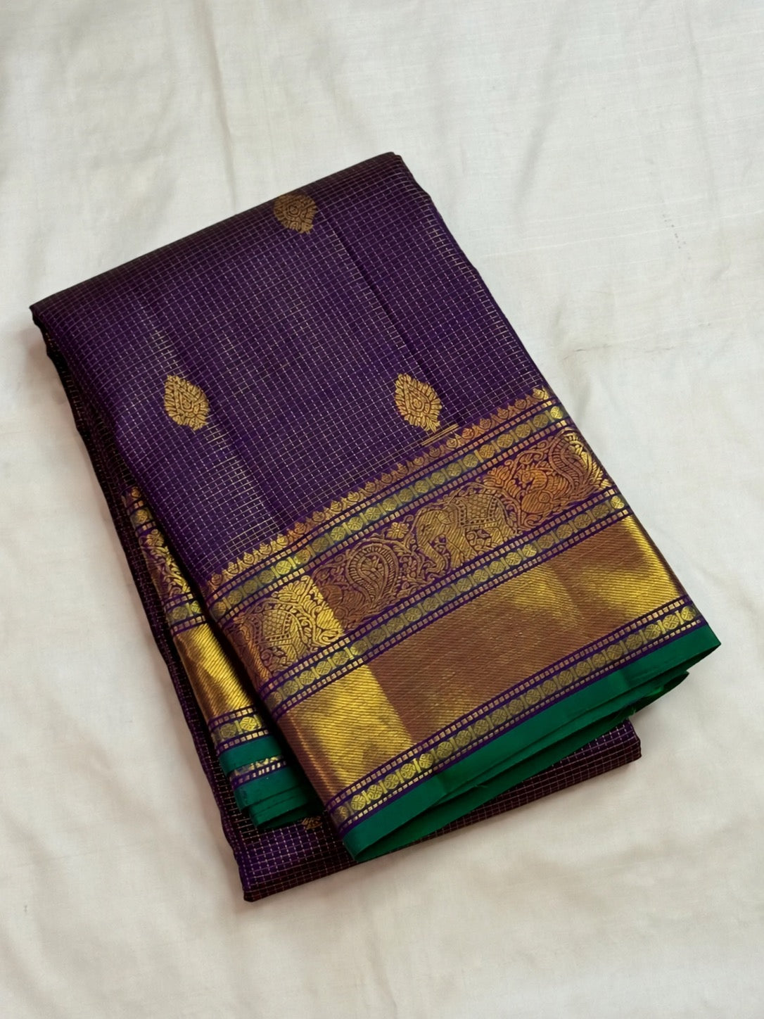 Oodha violet Kanjivaram handwoven silk saree with green selvedge