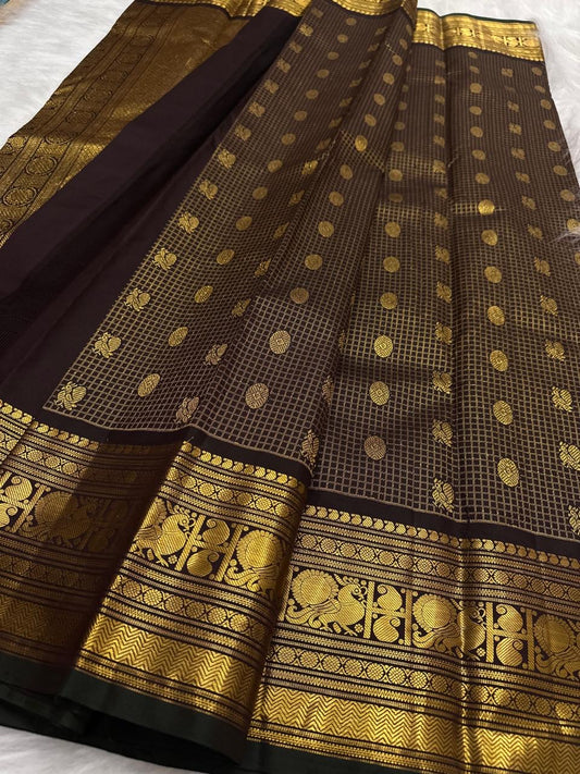 Deep brown lightweight handwoven pure silk Kanjivaram saree with Zari Kattam body Mayil Chakram butta and ornate antique gold zari border overview