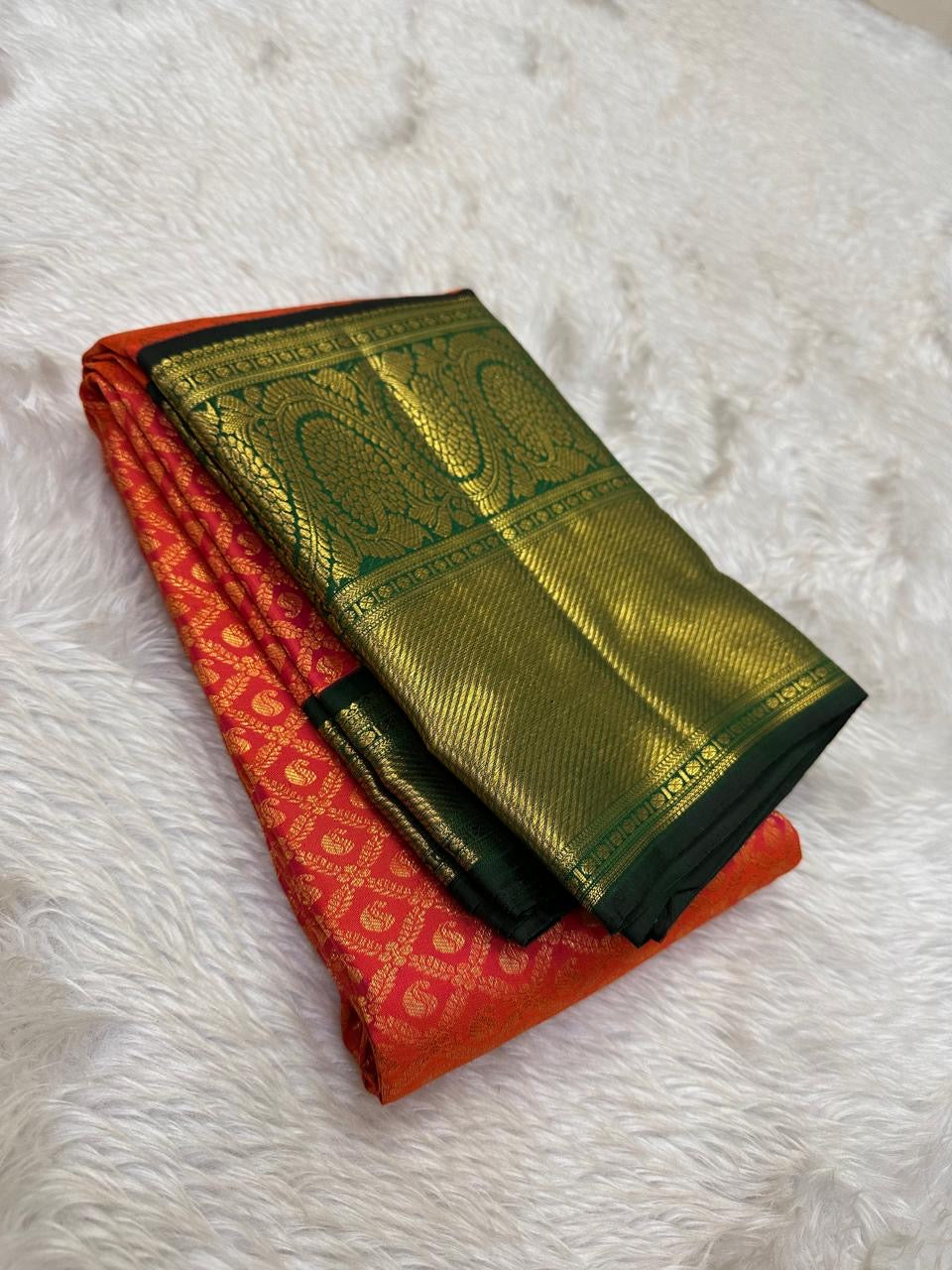 Deep Forest Green border with large Maanga gold-zari forms.