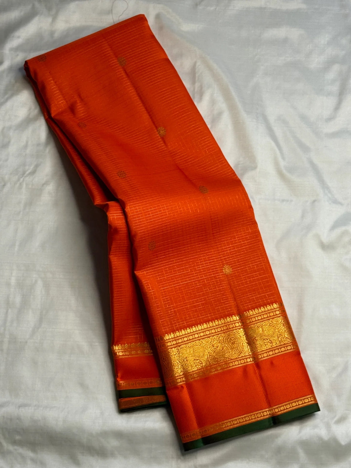 Kesari Orange Pure Silk Kanchipuram Zari Kattam saree.