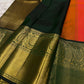 Ember Orange and Deep Forest Green Zari Kattam Kanjivaram saree.