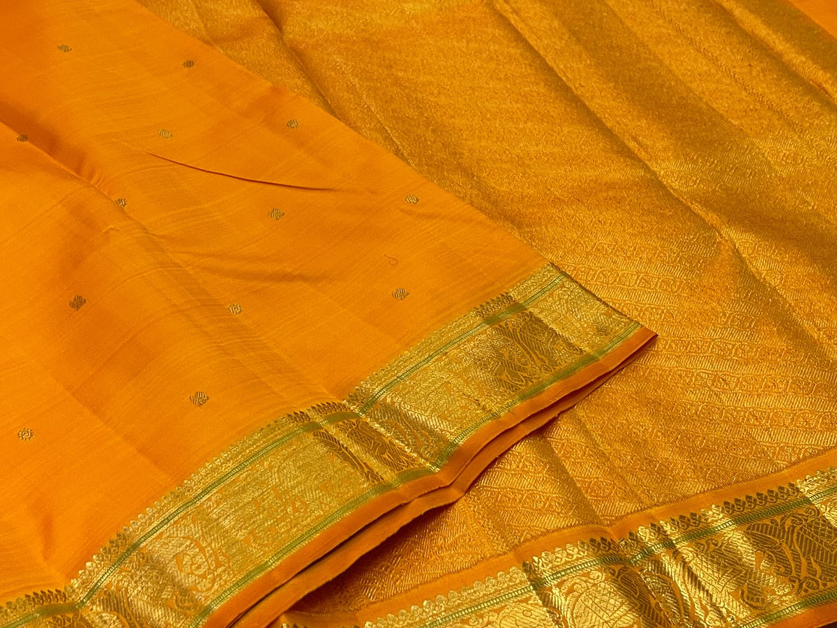Kesari Orange Handwoven Pure Silk Kanjipuram Butta Saree with Green-Edged Gold Zari Border