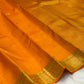 Kesari Orange Handwoven Pure Silk Kanjipuram Butta Saree with Green-Edged Gold Zari Border