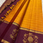 Saffron Orange pure silk Kanchi Pattu saree, Rettapet weave with Deep Maroon border — full drape view