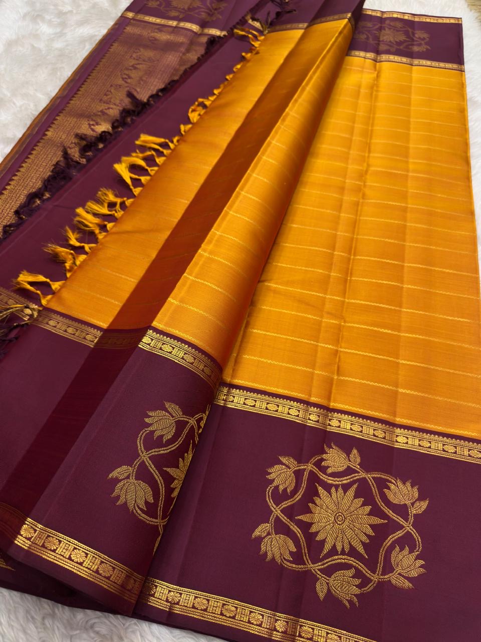 Saffron Orange pure silk Kanchi Pattu saree, Rettapet weave with Deep Maroon border — full drape view