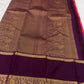 Orange Kanjivaram Paalum Pazhamum saree with a gold-zari border.