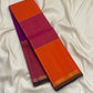 Orange and pink Kanchi Kattam pure silk saree draped to show the checks