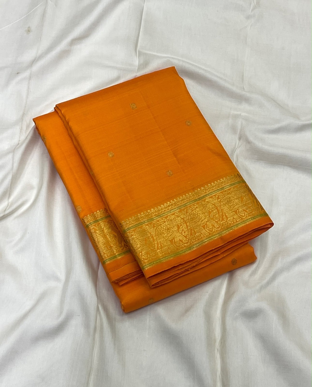 Kesari Orange Handwoven Pure Silk Kanjipuram Butta Saree with Green-Edged Gold Zari Border