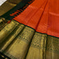 Ember Orange Kanchipuram silk with fine gold Zari Kattam geometry.