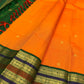 Orange Pure Silk Kanjeevaram saree showing the Maragatham green layered border against the marigold body.
