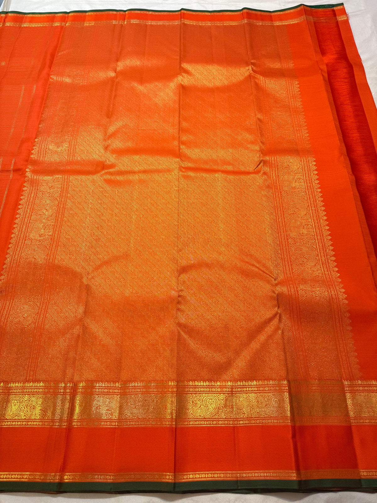 Handwoven Kesari Orange Pure Silk Kanchipuram.