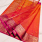 Orange and rani pink handloom Chanderi Katan silk saree, close-up of the silk texture