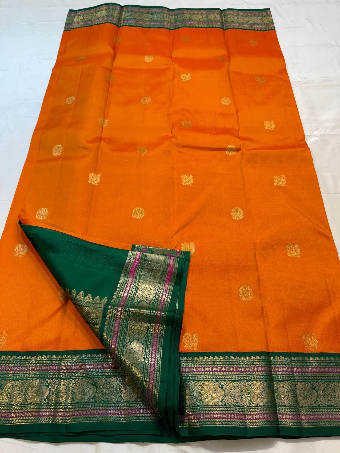 Orange Handwoven Pure Silk Kanchipuram Saree with Green Varisaipet Border