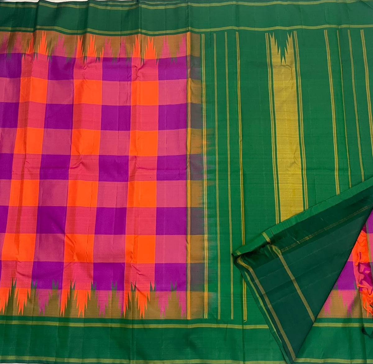 Orange and violet Kanchi Kattam pure silk saree draped to show the checks