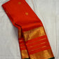 Radiant jewel-toned orange Pure Silk Kanchipuram Varisaipet saree with luminous body and traditional border bands.