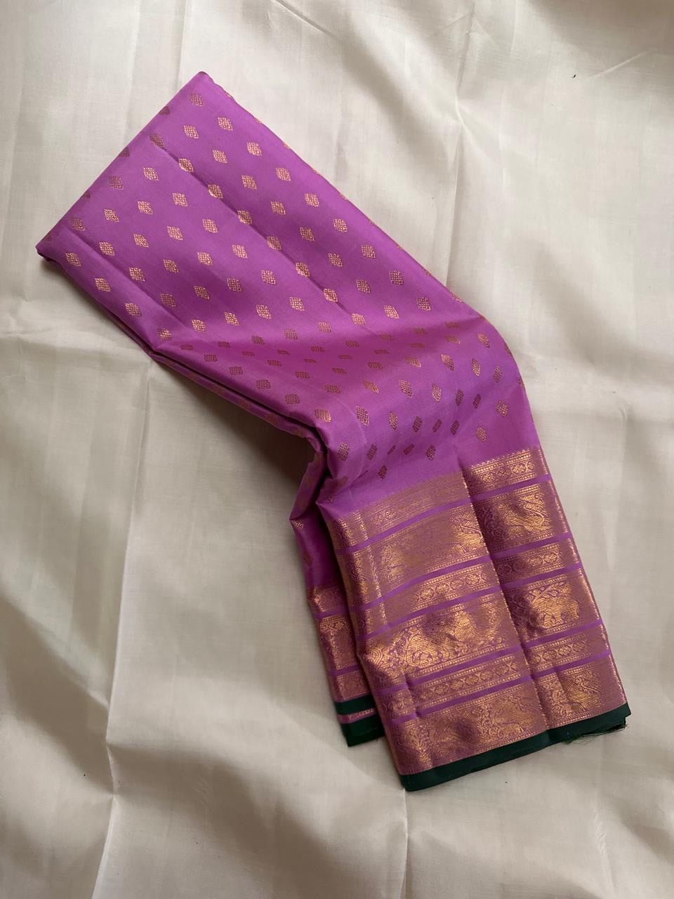 Orchid lilac handwoven pure silk Kanchipuram Varisaipet saree with gold zari buttas and a leaf-green accent