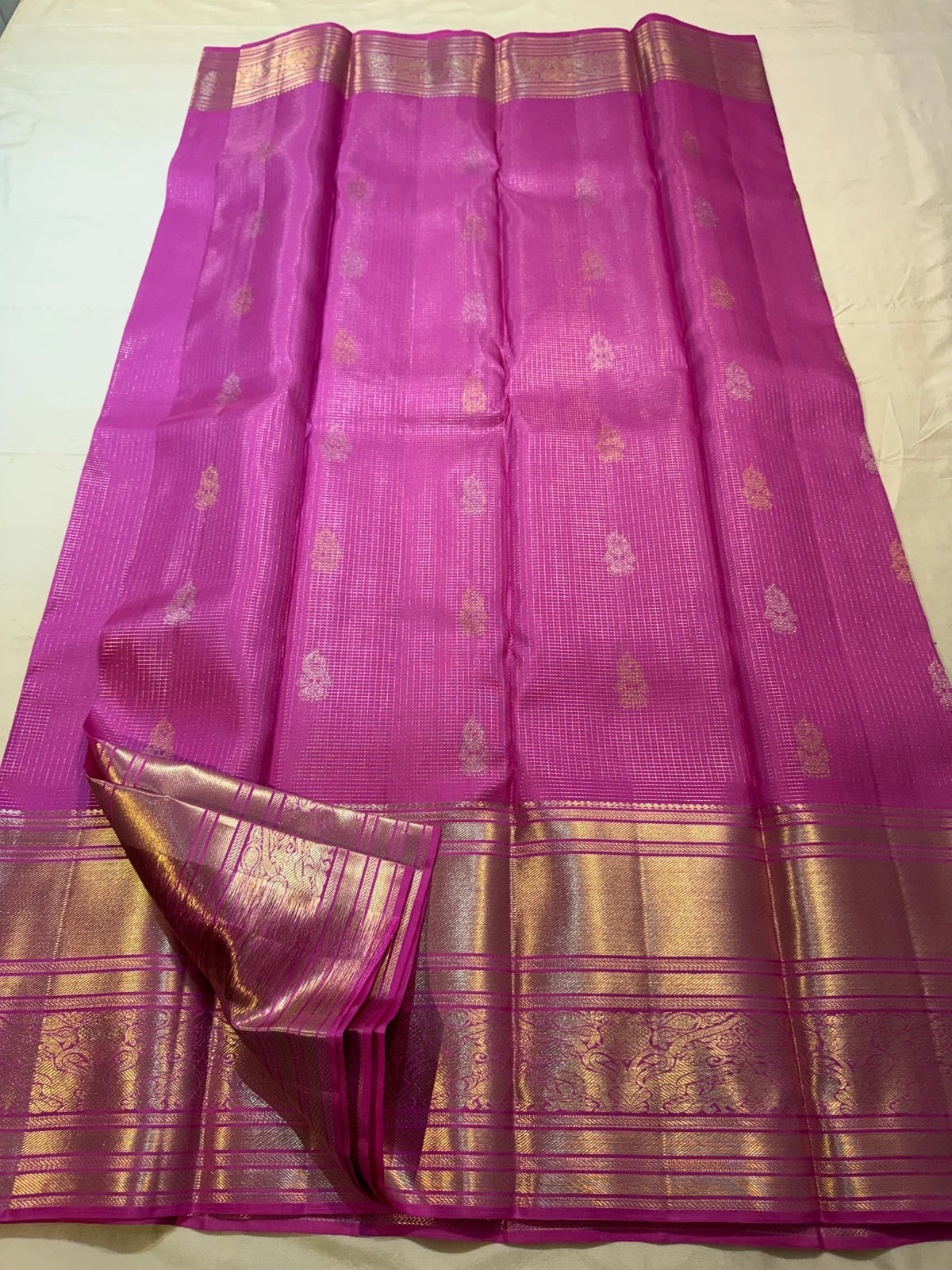 Orchid pink Kanchipuram saree with Banarasi-weave zari border and Malli Moggu detailing